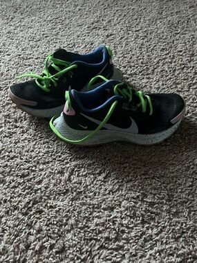 Nike Black Sneakers with Neon Green Laces and White Swoosh